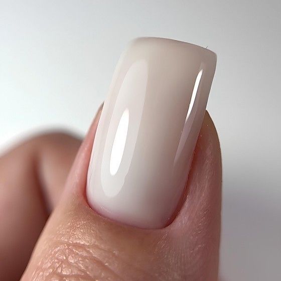 Камуфлюючий топ для нігтів DARK Milky White Top, молочний, 10 мл DMilkyWhiteTop10 фото